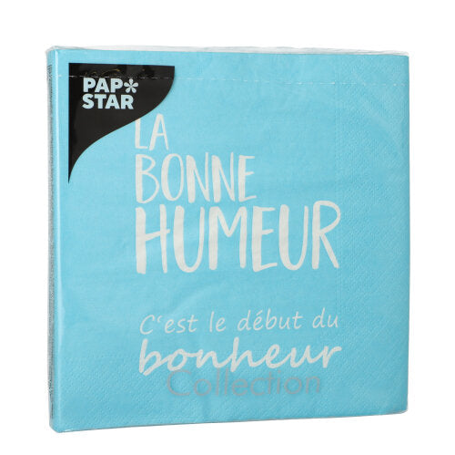 Eine blaue Packung PAPSTAR 20 Servietten, 33x33 cm, 3-lagig, mit "La bonne humeur c'est le début du bonheur Collection" in weiß und dem Logo der PAPSTAR GmbH oben links.