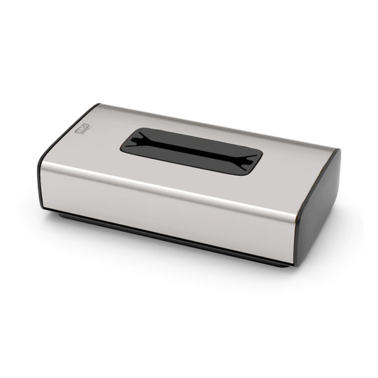 Der Tork 460013 Spender für Kosmetiktücher aus der Image Line F1-Kollektion von TORK – Essity Professional Hygiene Germany GmbH ist eine Tissue-Box aus Edelstahl mit einem rechteckigen Schlitz an der Oberseite. Er präsentiert sich im Edelstahl-Design, hat schwarz lackierte Kanten und einen minimalistischen Stil, der sich ideal für die Einzelblattentnahme eignet.