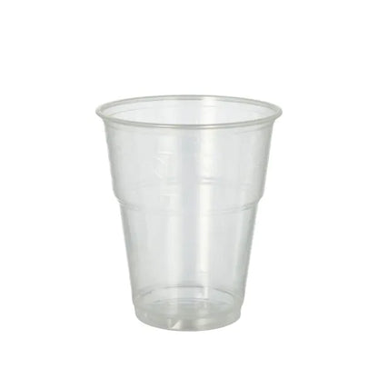 Paharul pentru băuturi reci PAPSTAR GmbH 70, PLA "pure" clar ca cristalul cu margine de spumă, este un pahar ecologic ideal pentru servirea băuturilor reci și este ilustrat aici gol pe un fundal alb simplu.