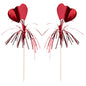 Der Deko-Picker PAPSTAR 100 der PAPSTAR GmbH verfügt über zwei rote Herzpicks mit metallischen Luftschlangen – ideal für stilvolle Präsentationen oder Buffets, hier auf weißem Hintergrund.
