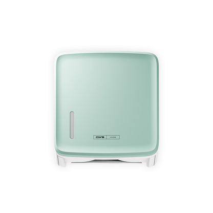 Un panou frontal CWS PureLine verde mentă, pătrat, montat pe perete, pentru distribuitorul de hârtie de la CWS, dispune de o fereastră ovală mică și un logo CMS pe partea frontală, afișat pe un fundal alb.