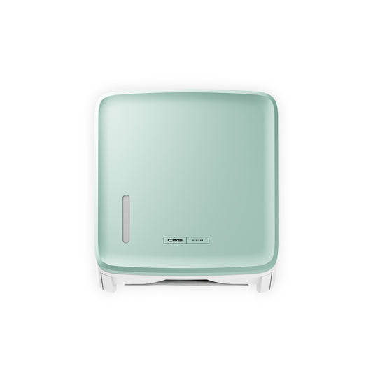 Ein quadratisches, an der Wand montiertes mintgrünes CWS PureLine Frontpanel für den Paper Spender von CWS verfügt über ein kleines ovales Fenster und ein CMS-Logo auf der Vorderseite, das vor einem weißen Hintergrund dargestellt ist.