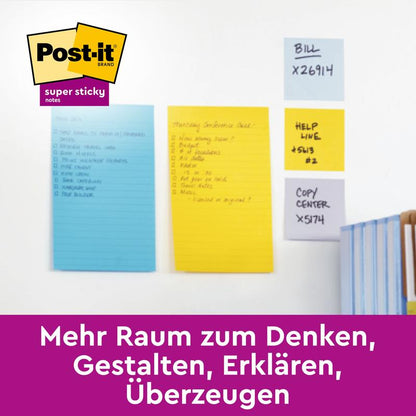 Două Post-it® Super Sticky Notes mari, căptușite, în roz și verde (127 mm x 203 mm, 45 de foi/bloc) de la 3M sunt atașate pe un perete alb cu dosare în apropiere. Textul german spune: "Mai mult spațiu pentru a gândi, crea, explica, convinge."