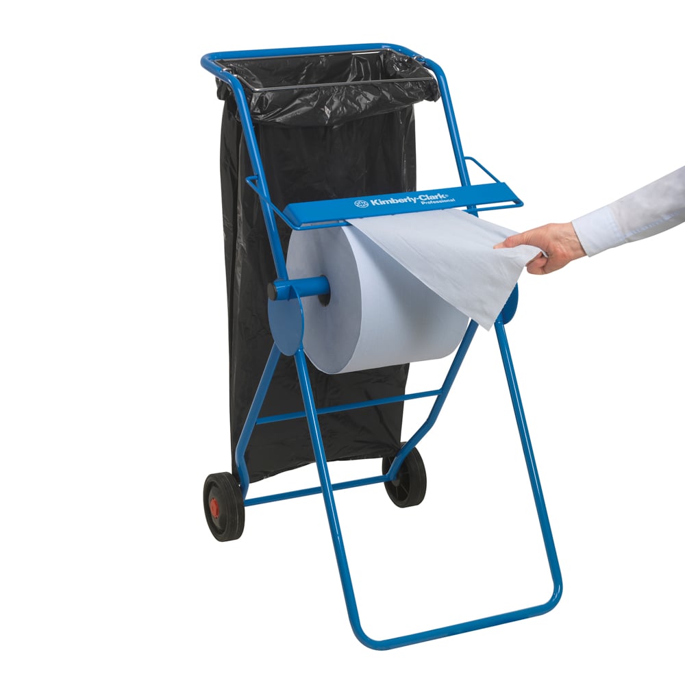 Dispenserul metalic albastru de la Kimberly-Clark GmbH poate găzdui o rolă mare de șervețele de hârtie WypAll® L30 (750 de foi) pentru curățenie industrială. Dispune de două roți și un sac de gunoi negru pe partea din spate cu eliberare ușoară a foilor.