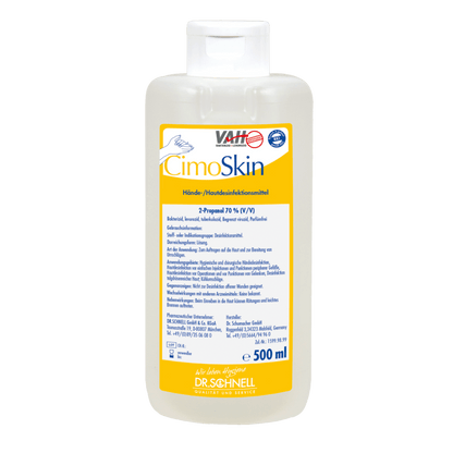 Eine 500-ml-Kunststoffflasche der Dr. Schnell CIMOSKIN Händedesinfektion der DR.SCHNELL GmbH & Co. KGaA, mit weißem Verschluss und einem gelb-weiß-blauen deutschen Etikett, das die hautfreundlichen, hygienischen Desinfektionseigenschaften hervorhebt.