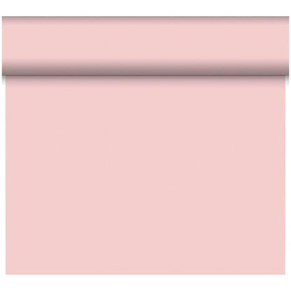 Eine Rolle Duni GmbH Bio-DC-Tete a Tete 0,4x24m hellrosa Tapete wird teilweise abgerollt, so dass ihre glatte, feste Oberfläche zum Vorschein kommt; der obere Teil bleibt gerollt, während der Rest vertikal hängt.