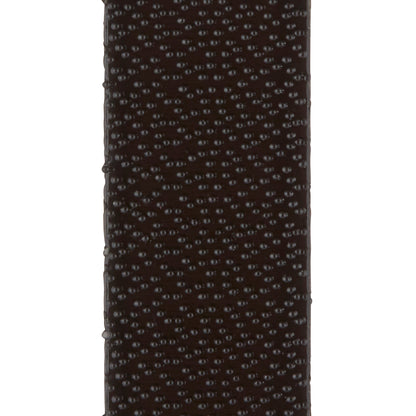 Nahaufnahme der dunkelbraunen, strukturierten Oberfläche mit erhabenen Punkten der 3M Deutschland GmbH Command™ Bilder-Montage Strips 17201BLK, mittelgroß, schwarz, 4 Sets-ideal für Bilder aufhängen ohne Nägel und rückstandslose Entfernung.