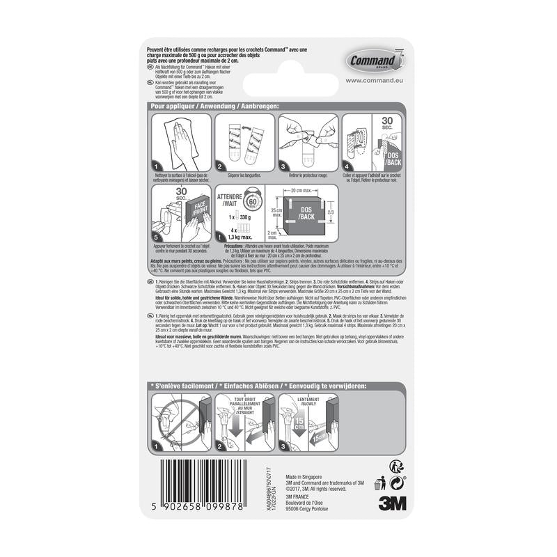Auf der Rückseite einer Packung der 3M Deutschland GmbH Kleine Command™ Strips S, 17022N befinden sich bebilderte, mehrsprachige Hinweise zum Anbringen und Entfernen von Klebestreifen ohne Nägel, um Wände beschädigungsfrei zu halten, sowie ein Barcode am unteren Rand.
