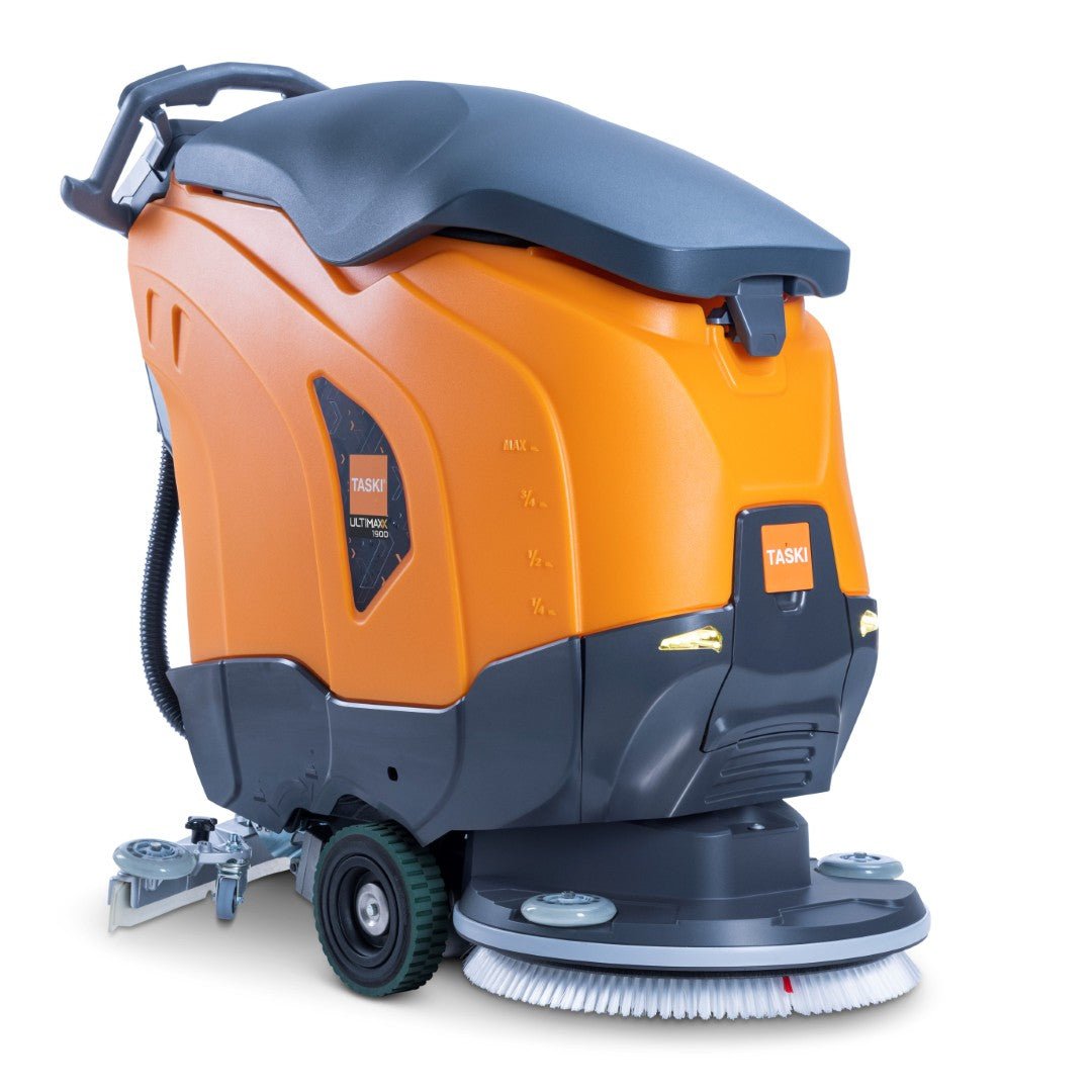 TASKI ULTIMAXX 1900 SD50 Performance BMS 25A EBU portocaliu-gri de la Diversey Deutschland dispune de roți mari, o perie frontală, un rezervor de 42 de litri și un disc de 50 cm pentru curățarea eficientă a suprafețelor mari. Logo-ul TASKI se află pe lateral și pe spate.