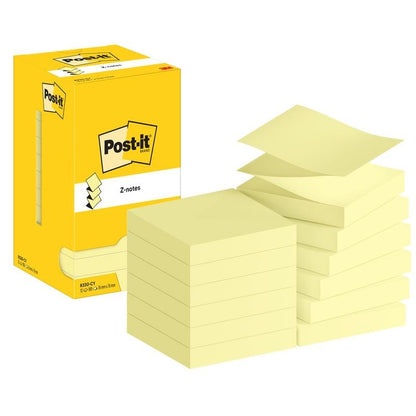 Imaginea arată un teanc de Post-it® Super Sticky Z-Notes Promotion, Galben (76 mm x 76 mm, 100 foi/bloc) de la 3M Deutschland GmbH cu ambalajul lor de carton. Cutia evidențiază logo-ul Post-it, iar o foaie este ușor ridicată.