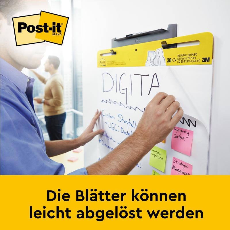 Cineva scrie pe chartul de întâlniri autoadeziv Post-it® Super Sticky pentru montare pe perete 559 (63,5 x 76,2 cm) de la 3M Deutschland GmbH. Mai multe note autoadezive sunt lipite pe el. Foile se desprind ușor.