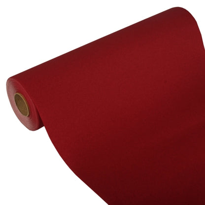 Un rulou de masă parțial derulat al PAPSTAR GmbH, Tissue „ROYAL Collection“ (24 m x 40 cm), își arată miezul de carton pe un fundal alb, demonstrând astfel materialul său de țesut de înaltă calitate și designul său elegant.