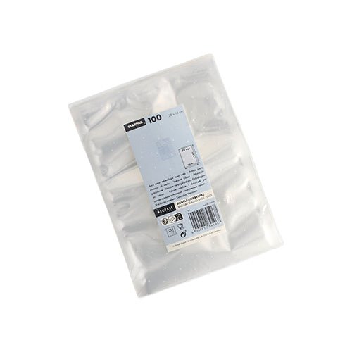 O pungă sigilată Starpak 100 Siegelrandbeutel, PA/PE transparent, este prezentată de sus cu etichetă vizibilă - un ambalaj clar ideal pentru utilizarea cu un aparat de vidat cu cameră la vidarea alimentelor.