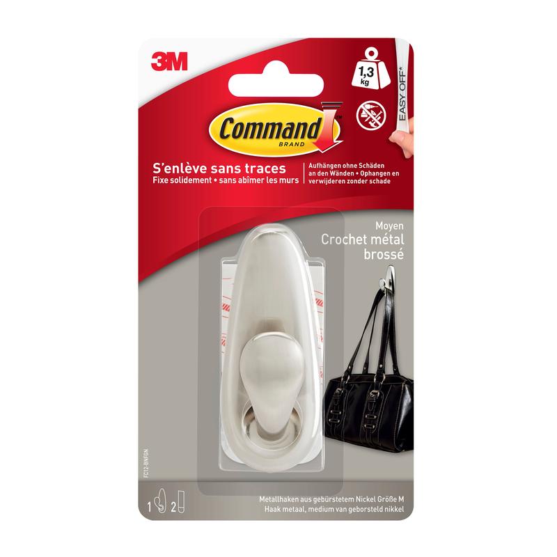 Cârligul metalic Command™ „clasic” de la 3M Deutschland GmbH, montat aici pe un perete și prevăzut cu o geantă de mână neagră, poate susține până la 1,3 kg și se îndepărtează curat, fără a deteriora pereții.