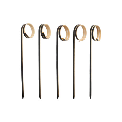 Fünf PAPSTAR 100 Fingerfood - Picker der PAPSTAR GmbH, jeweils mit gewellter Spirale, sind senkrecht auf weißem Grund angeordnet - ideal zum stilvollen Servieren von Fingerfood bei Festen.