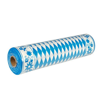 Un fugă de masă Airlaid "Bayrisch Blau" (24 m x 40 cm) parțial despachetat, asemănător cu materialul textil, cu romburi albastre și albe și un design de margine floral - ideal pentru o decorare fermecătoare a mesei în stil bavarez. Marcă: PAPSTAR GmbH.