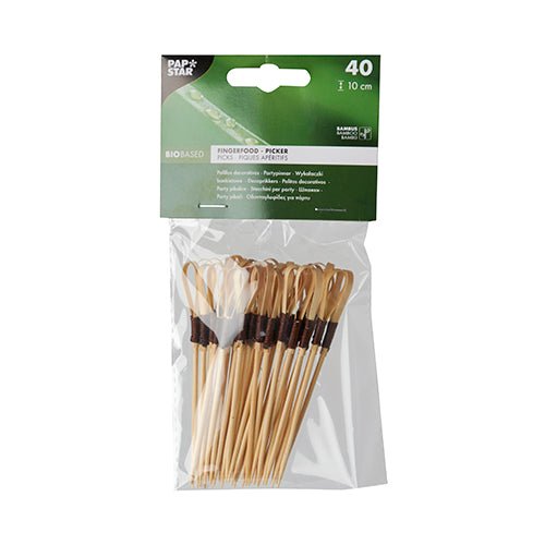 Un ambalaj din plastic transparent al PAPSTAR GmbH conține 40 de scobitori pentru aperitive "Loop" din bambus, cu o lungime de 10 cm fiecare - ideale pentru gustări și aperitive. Scobitorile ecologice sunt legate cu o banderolă închisă la culoare și au o etichetă verde-albă cu detalii de marcă.