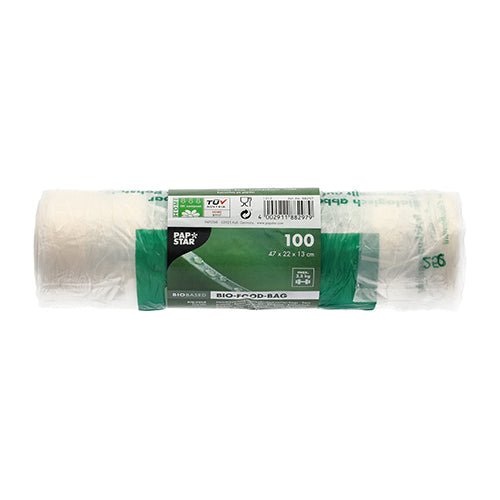 Cele 100 de pungi de transport cu mâner din folie bio transparentă (47x22x13 cm) ale PAPSTAR GmbH pe sul sunt pungi nod ecologice, ideale pentru utilizarea zilnică, ambalate practic cu etichetă verde-albă.