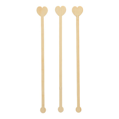 Drei PAPSTAR 100 Getränke-Quirle, Bambus „pure“ der PAPSTAR GmbH sind vertikal auf weißem Hintergrund angeordnet und demonstrieren ihre umweltfreundliche und biologisch abbaubare Eigenschaft.