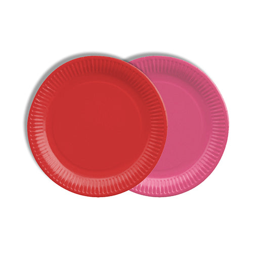 Abgebildet sind zwei übereinanderliegende PAPSTAR 12 Teller, Pappe rund Ø 18 cm farbig sortiert der PAPSTAR GmbH: einer einfarbig rot, einer rosa. Beide umweltfreundlichen Teller mit geriffeltem Rand stehen auf schlichtem weißem Hintergrund.