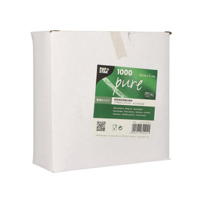 O cutie de carton alb închisă de la PAPSTAR GmbH cu inscripția "PAPSTAR bețe de amestecat din lemn pure, 14 cm" conține 1000 de bețe de băut ecologice, biodegradabile, într-o cutie pliabilă. Laturile cutiei sunt neimprimate.