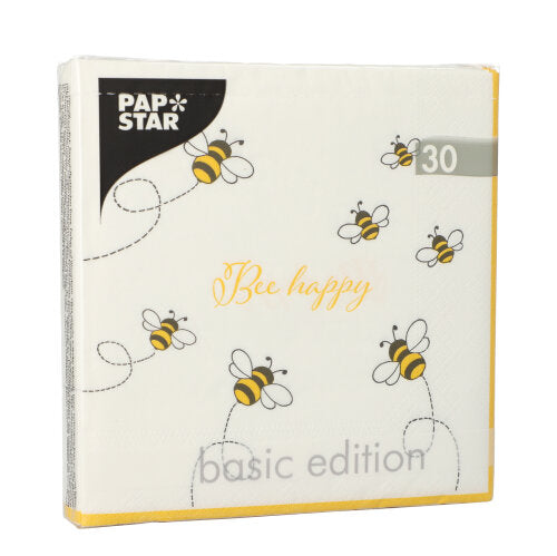 Este ilustrat un pachet de PAPSTAR 30 șervețele, 3 straturi (33x33 cm, 1/4 pliat) de la PAPSTAR GmbH, cu albine de desene animate, „Bee happy” în scris galben și „Basic Edition” în partea de jos.
