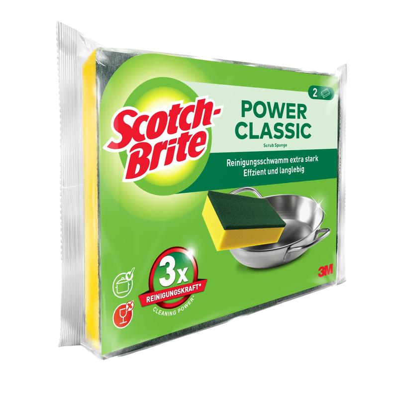 Este ilustrat un ambalaj de bureți de curățare Scotch-Brite® Classic de la 3M Deutschland GmbH cu doi bureți. Pe ambalajul predominant verde sunt ilustrate un burete și un vas de metal, alături de text în engleză și germană.