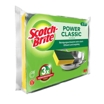 Este ilustrat un ambalaj de bureți de curățare Scotch-Brite® Classic de la 3M Deutschland GmbH cu doi bureți. Pe ambalajul predominant verde sunt ilustrate un burete și un vas de metal, alături de text în engleză și germană.