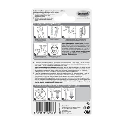 Partea din spate a unui ambalaj Command™ pentru agățători de pânză de la 3M Deutschland GmbH conține instrucțiuni ilustrate de utilizare/eliminare în patru limbi, un cod de bare în partea de jos, informații despre producător și logo-ul 3M.