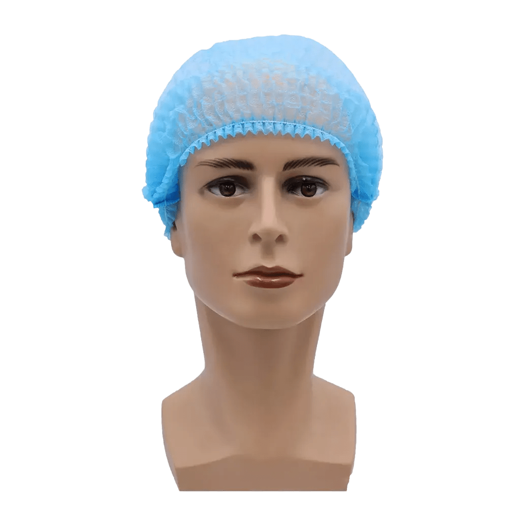 Imaginea prezintă un cap de păpușă cu o plasă de păr de unică folosință MED-COMFORT Klipphaube 52 cm de la AMPri Handelsgesellschaft mbH în albastru deschis. Capul are o suprafață curată și netedă și trăsături faciale neutre, fiind poziționat pe un fundal simplu alb, oferind astfel protecție igienică.