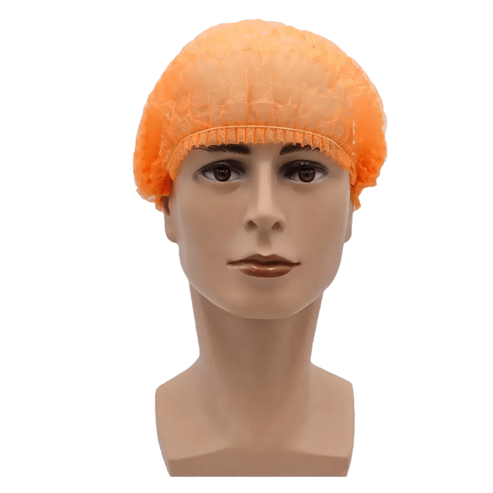 Imaginea prezintă un cap de păpușă cu o plasă portocalie AMPri MED-COMFORT Klipphaube 52 cm de la AMPri Handelsgesellschaft mbH. Fundalul este simplu alb. Căciula din polipropilenă acoperă întregul cap și se potrivește strâns la linia părului, oferind astfel protecție igienică.