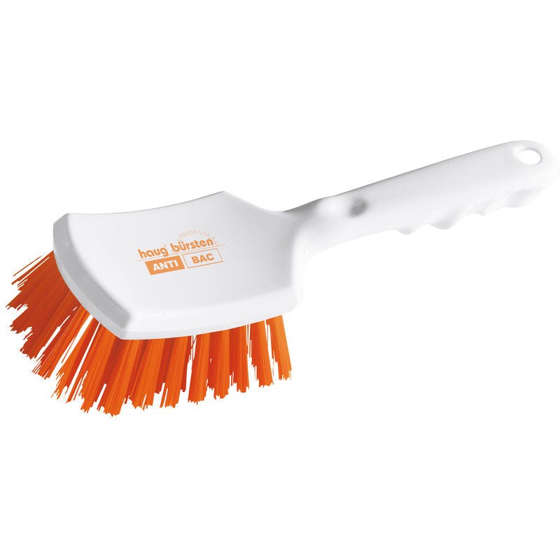 Haug Bürsten KG ANTI BAC Perie cu mâner din plastic alb cu mâner ușor curbat și peri portocalii rigizi din PBT (ø 0,50 mm), care sunt înclinați pentru frecare. Pe capul periei sunt imprimate "ANTI BAC" și "Haug Bürsten". Dimensiune: 260x72x35mm.