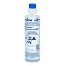 O sticlă de 1 litru de detergent universal pe bază de alcool „Kiehl Keradet-Konzentrat-Aktiv” de la Johannes Kiehl KG, pentru curățare fără urme, cu capac albastru și etichetă multilingvă conținând informații despre produs și instrucțiuni de utilizare.
