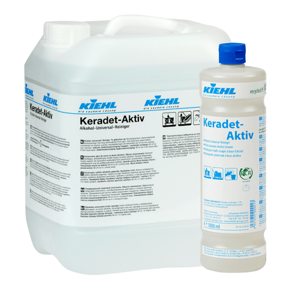 Două recipiente Kiehl Keradet-Aktiv Curățător Universal cu Alcool ale Johannes Kiehl KG: un bidon de 10L și o sticlă de 1L, ambele cu scris albastru/negru pe etichete albe. Ideal pentru curățarea tuturor suprafețelor.