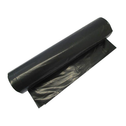 O rolă de saci de gunoi Abena Re-Seller GmbH de 70 L (575x1000 mm, 32 my LDPE) pentru eliminarea deșeurilor, cu un sac negru parțial desfășurat și așezat plat.