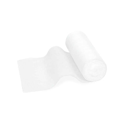 O rolă de bandaj elastic de fixare Meditrade ABE® Last – diferite dimensiuni, parțial derulată, așezată pe un fundal alb simplu. Hârtia este moale și are o textură de bandaj elastic de fixare.