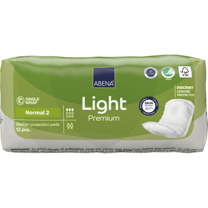 Un pachet ABENA Light Normal 2, Premium de la Abena Re-Seller GmbH (12 bucăți) oferă protecție discretă împotriva scurgerilor și capacitate ridicată de absorbție. Ambalajul verde-alb prezintă informații despre produs și pictogramele avantajelor extinse.