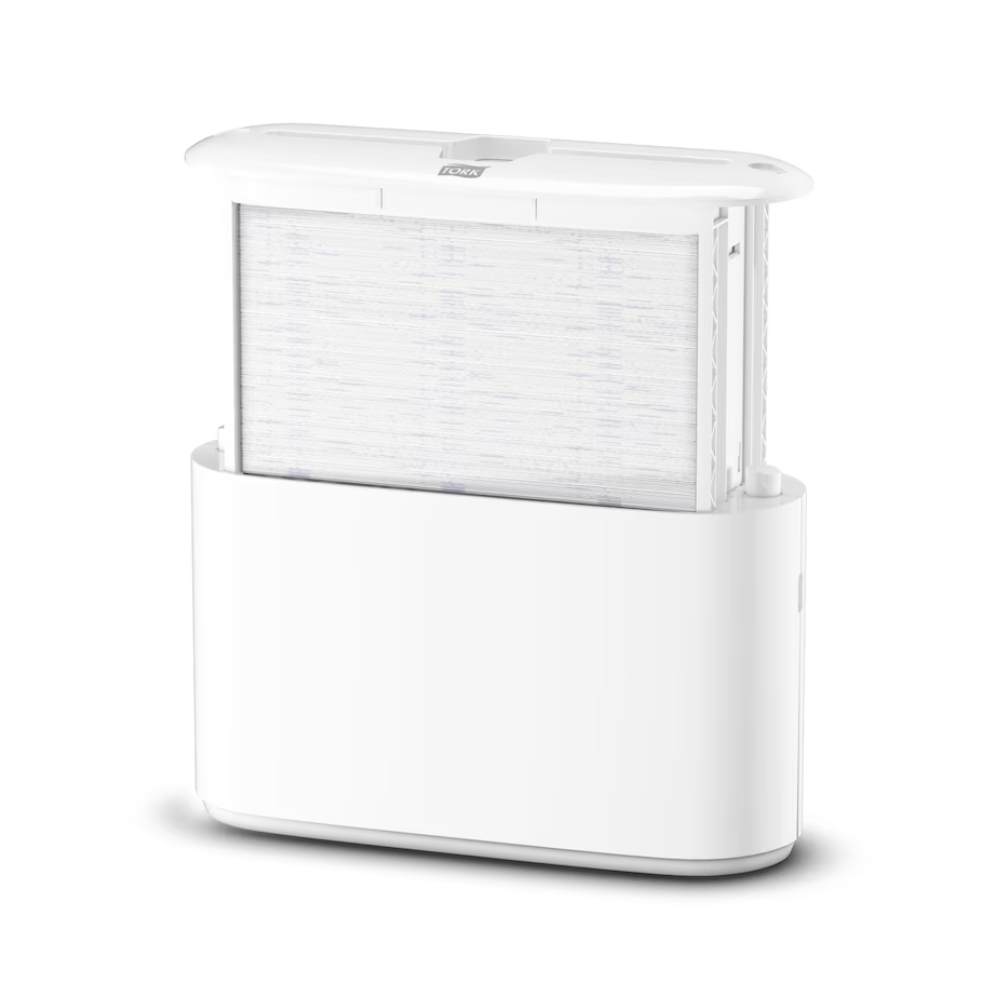 Distribuitorul de masă Tork Xpress® 552200 pentru prosoape multifold Elevation H2 de la TORK - Essity Professional Hygiene Germany GmbH impresionează printr-un design subțire și minimalist, cu un filtru vizibil integrat în bază. Filtrul poziționat vertical îmbunătățește estetica generală și partea superioară este ușor deschisă pentru a demonstra funcționalitatea sa eficientă.