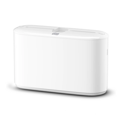 Un dispozitiv electronic alb, dreptunghiular, cu margini netede și o suprafață superioară plată cu o fantă centrală, care reflectă stilul elegant al distribuitorului de masă Tork Xpress® 552200 pentru prosoape multifold Elevation H2 de la TORK – Essity Professional Hygiene Germany GmbH.