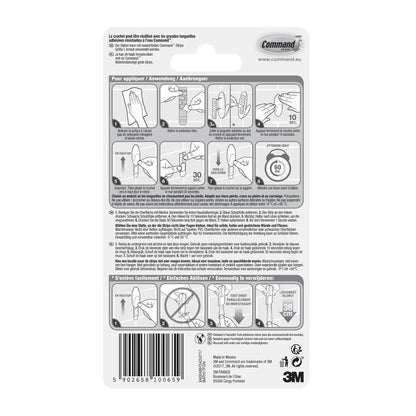 Partea din spate a unui ambalaj de cârlige pentru prosoape de baie Command™ de la 3M Deutschland GmbH, cu instrucțiuni ilustrate de utilizare și îndepărtare, avertismente de siguranță și informații despre produs în mai multe limbi. Logo-ul 3M și codul de bare sunt ilustrate în partea de jos.