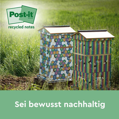 Două stupi colorați stau în iarbă la soare. În colțul din stânga sus apare un logo verde Post-it® Recycling Notes (38 mm x 51 mm, 100 foi/bloc, 100% PEFC) de la 3M Deutschland GmbH. Jos textul: „Fii conștient sustenabil.