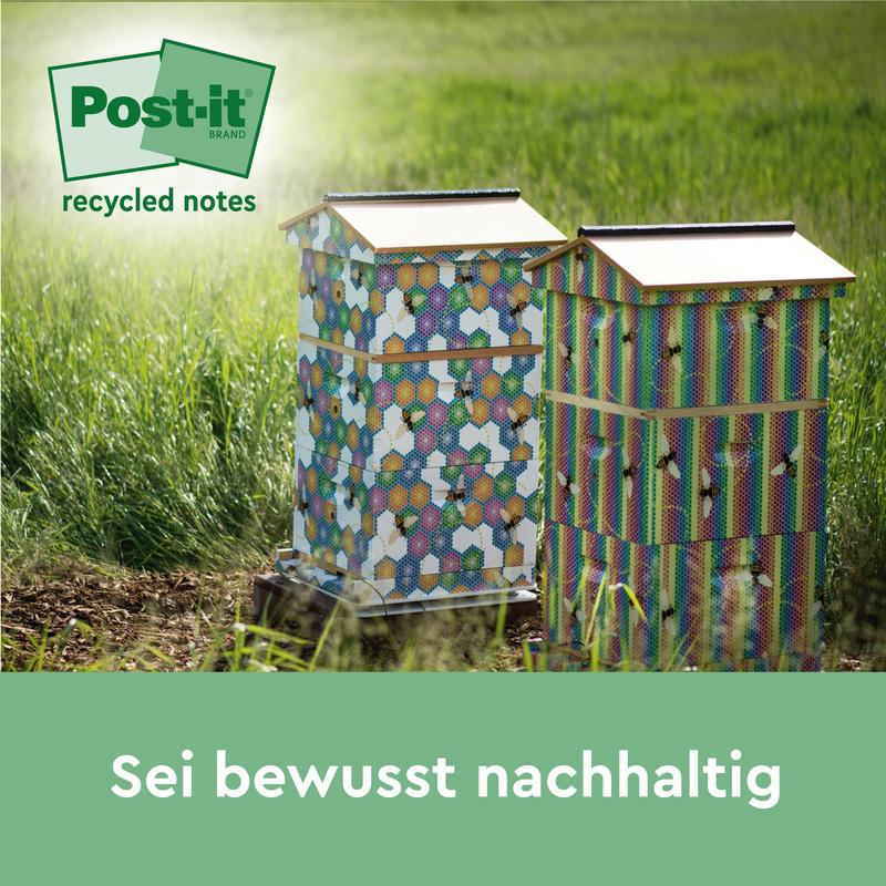 Două stupi colorați sunt pe o pajiște, deasupra un logo verde Post-it® Super Sticky 100% Notes de reciclare. Textul de dedesubt spune: "Fii conștient sustenabil". Marcă: 3M Deutschland GmbH.