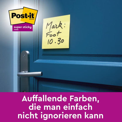 O notiță galbenă Post-it® Super Sticky (76 mm x 76 mm, 45 foi/bloc, 100% PEFC) de la 3M Deutschland GmbH cu inscripția de mână "Mark: Foot 10.30" este lipită pe o ușă albastră deasupra clanței și afișează branding și text în germană.