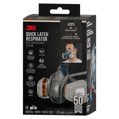 Eine schwarz-graue Box der 3M™ Quick Latch-Atemschutzmaske 6502QLKIT-1 von 3M Deutschland GmbH mit austauschbaren A2P3 Filtern, Produktbildern, Anwendungssymbolen, technischen Angaben und einem Foto einer Person mit Maske auf der Vorderseite.