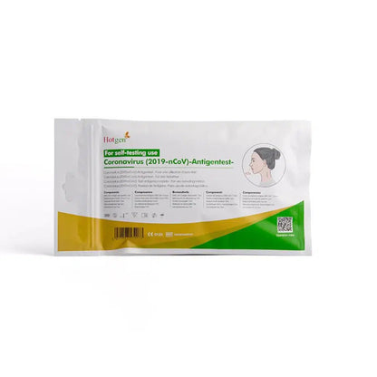 Hotgen Sars-CoV-2 Antigen Laien Schnelltest CE0123, un autotest de încredere pentru detectarea SARS-CoV-2, se remarcă printr-un branding verde-galben distinctiv. Ambalajul conține pe partea din față o ilustrație cu instrucțiuni pentru prelevarea nazală și este conceput multilingv pentru a asigura o utilizare ușoară.
